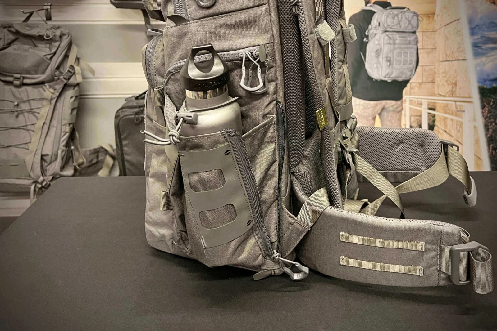 Daily carry water bottles on the side of your backpack.