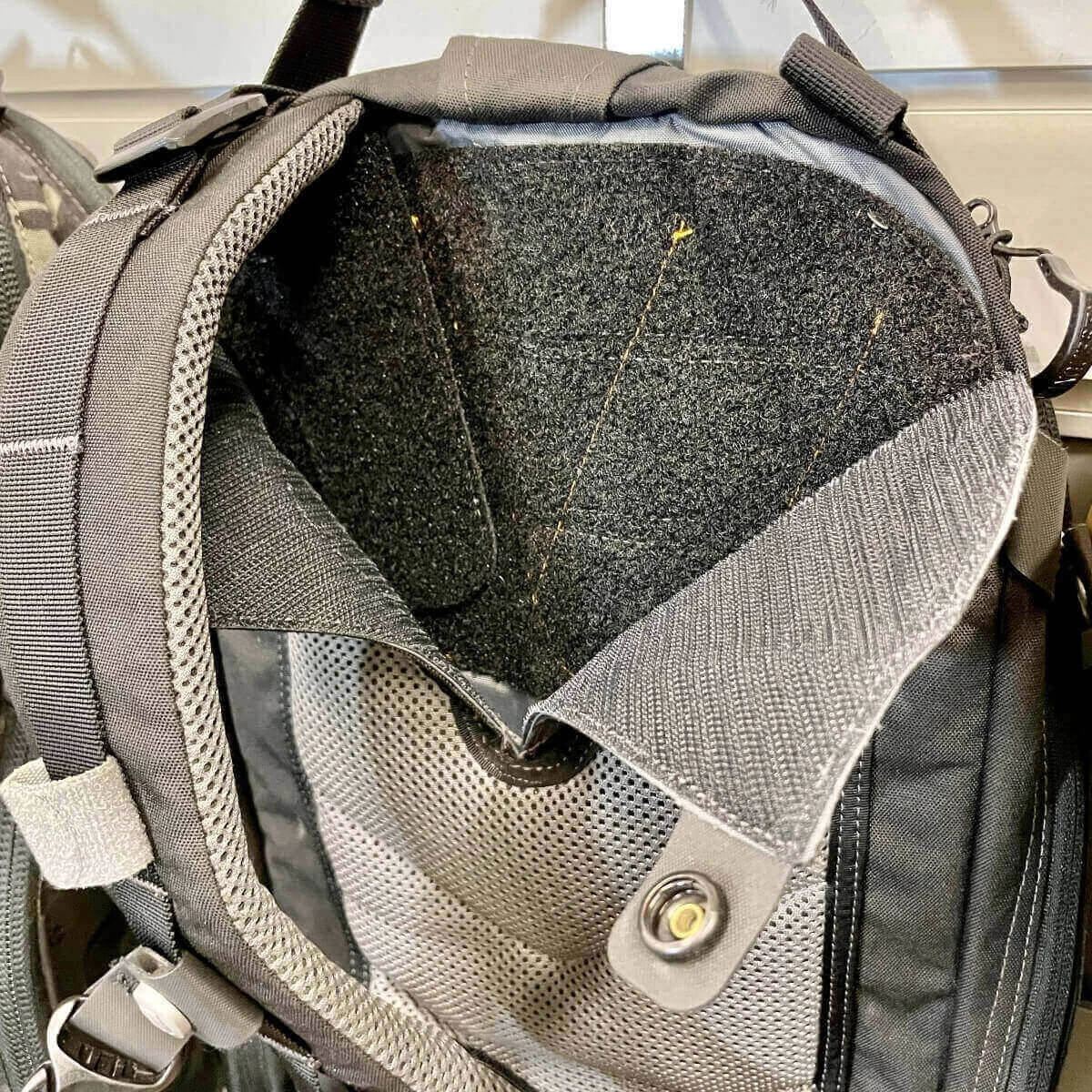Convertible sling backpack suspension for versatility